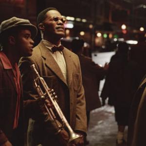 L to r A young Quincy Jones LARENZ TATE and Ray Charles JAMIE FOXX make the rounds of the Seattle jazz scene in the musical biographical drama Ray