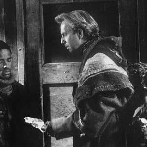 Still of Kevin Costner and Larenz Tate in The Postman 1997