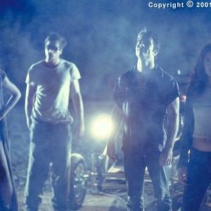 Cym (Phina Ourche,) Pen (Simon Rex,) Kit (Johnathon Schaech) and Teddy (Alexis Thorpe) are a roving band of forsaken youths who viciously feed on the hapless victims they find in the dead of night along deserted highways