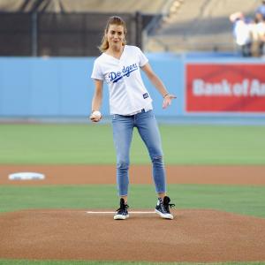 Actress Kate Walsh throws out the ceremonial first pitch before the game between the San Diego Padres and Los Angeles Dodgers at Dodger Stadium on July 10, 2014 in Los Angeles, California.