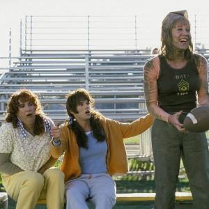 (Left) In an all-girl football game, Doofer, Dave, and Adam - posing as (left to right) Roberta (Williams), Daisy (Watson), and Adina (Rosenbaum) - find themselves on the sidelines... leaving the outcome of the game in the hands of the real girls.