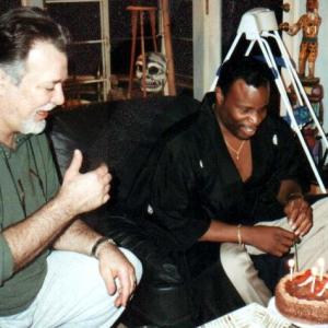 Grand L Bush and his best friend TV writerproducer Nicholas Corea celebrate Grands birthday While on his deathbed Corea wrote an episode Brothers in Arms for WALKER TEXAS RANGER which starred Bush Corea died of cancer in 1999
