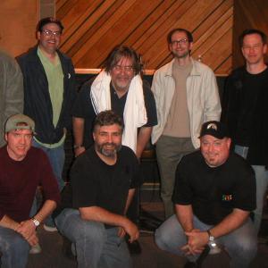 Top row, John DiMaggio, Brian Sheesley, Matt Groening, David X. Cohen, Rich Moore, James Purdum, Bottom row, Billy West, Maurice LaMarche, Mike Rowe