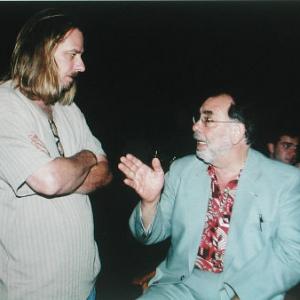 Don FauntLeRoy discussing a set up with Francis Ford Copolla