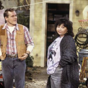 Still of Roseanne Barr and William Sadler in Roseanne 1988