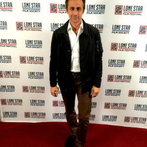 Crispian Belfrage on the carpet at the Texas Premier of 