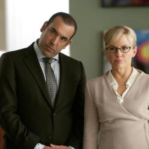 Still of Rachael Harris and Rick Hoffman in Suits 2011