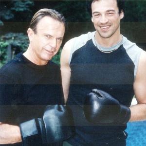 Aleks Paunovic and Sam Neill on the set of Framed Aleks was the boxing coordinator and also performed stunts for the film