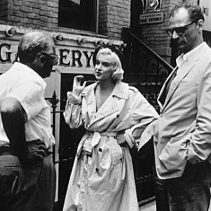 Lets Make Love M Monroe on the set with George Cukor and husband Arthur Miller 1960