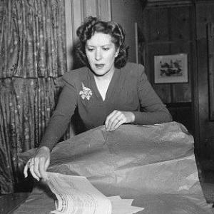Gracie Allen at home during a charity event at the Tick Tock Tea Room, c. 1939.