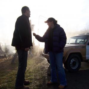 Cinematographer Glen Winter and Director Mairzee Almas on the set of Smallville