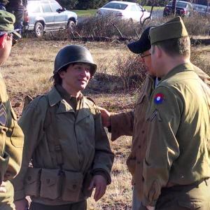 Director Michael Fraticelli introduces actor Johnny Alonso to one of the extras on set. Johnny plays Italian soldier Corporal Fiato in 