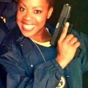 Tangie Ambrose as Delia Parmalee with her glock!!!