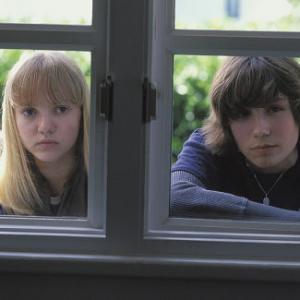 Irene Gorovaia left and John Patrick Amedori right star as the young Kayleigh and Evan