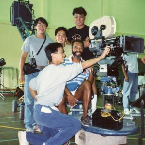 Haskell and 'KICKBOXER' crew on location at Fort Stanley in Hong Kong