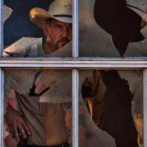As Sheriff Joe Cain in GALLOWS ROAD (2015)