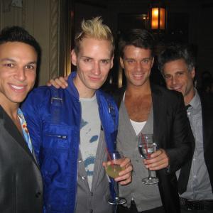 Honorees Casper Andreas and Jesse Archer with friends at the OUT 100 party, November 2008.