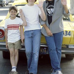 Both the young and old versions of William pose with director Cameron Crowe