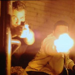 Still of Michael Aronov and Larenz Tate as undercover partners and rivals in GUN HILL.
