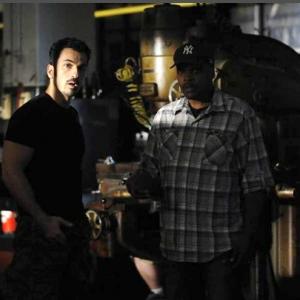 Michael Aronov as griddy undercover cop Danny Raden with director Reggie Rock Bythewood in GUN HILL