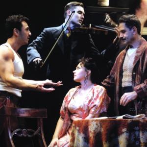 Michael Aronov, Seth Numrich, Tony Shalhoub, and Dagmara Dominczyk on stage in GOLDEN BOY at the Belasco Theatre on Broadway