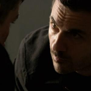 Still of Michael Aronov as undercover cop Mike Cahill  apposite Jim Caviezel in PERSON OF INTEREST