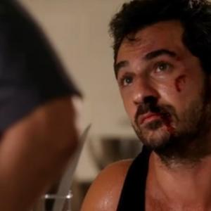 Still of Michael Aronov as resilient baddy in BURN NOTICE