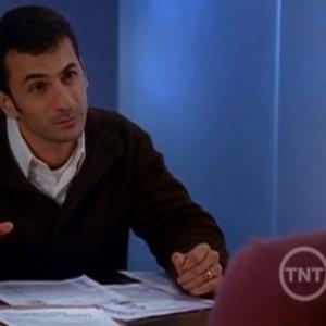 Still of Michael Aronov as concealed war criminal Armand Marku in the season finale of THE CLOSER apposite Kyra Sedgwick
