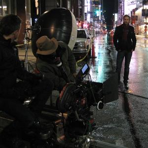Marcus Ashley waits between takes on location in Toronto Canada