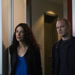 Still of Aaron Ashmore Joanne Kelly and Russ Martin in Warehouse 13 2009