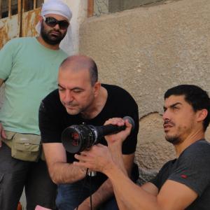 On set with Director Hany Abu Assadon the shoot of Omar
