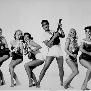 Elvis Presley with Pamela Akert Darlene Tompkins Joan Blackman Jenny Maxwell and Christian Kay in Blue Hawaii Paramount 1961