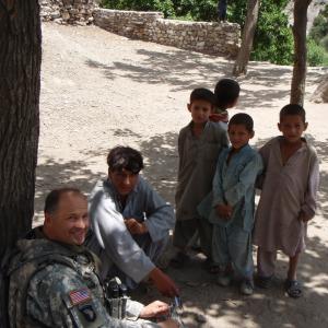 Visiting with Afghan Children while waiting for the Women's shura to end. Village of Zirat, Nuristan Province, Afghanistan.
