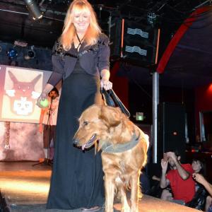 Gloria Winship and Star Golden Animal Actors walking the runway for Fashion Show
