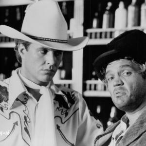 Still of Tom Berenger and G.W. Bailey in Rustlers' Rhapsody (1985)
