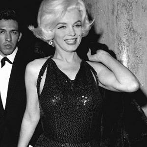 Marilyn Monroe with Mexican writer Jose Bolaos at a Hollywood Party March 1962