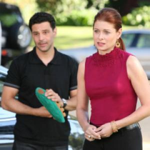 Still of Debra Messing and David Alan Basche in The Starter Wife 2008