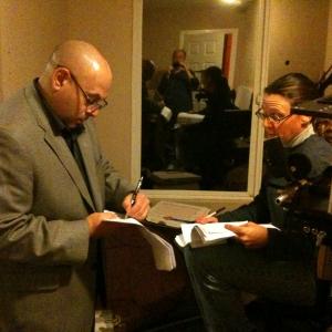 Dave Bean gets script changes from screenwriter Kimberly Kaplan on the set of indie thriller 
