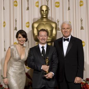 Academy Awardwinner Simon Beaufoy center with presenters left to right Tina Faye and Steve Martin backstage at the 81st Academy Awards are presented live on the ABC Television network from The Kodak Theatre in Hollywood CA Sunday February 22 2009