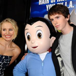 Kristen Bell and Freddie Highmore at event of Astro Boy 2009
