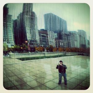 Selfie in reflection on the bean in Chicago in the rain