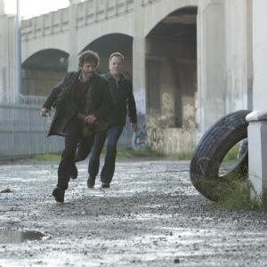Still of Kiefer Sutherland and Rob Benedict in Touch 2012