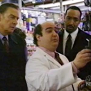 Mike Benitez as Pharmacist Dale Berck on NBC's Law And Order. Pictured Left to Right - Jerry Orbach, Mike Benitez and Jesse L. Martin.