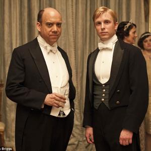 Paul Giamatti as Harold Levinson and Michael Benz as his valet Ethan Slade