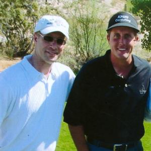 Berris with Phil Mickelson on a set in Arizona. His extensive sports background makes Berris the choice of many top athletes.