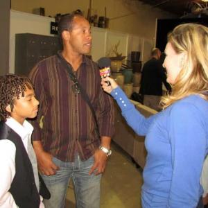 Erik Betts with Presenter and son Jaden Betts being interviewed at the LA Animal Hero Kids Awards