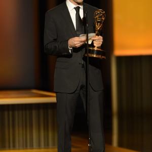Andy Bialk accepts the award for Outstanding Individual Achievements in Animation for Dragons Riders of Berk onstage at the 2013 Primetime Creative Arts Emmy Awards on Sunday September 15 2013 at Nokia Theatre LA Live in Los Angeles Calif