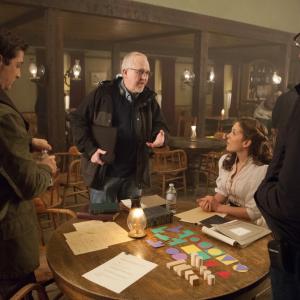 Executive Producer and head writer Brian Bird discussing script with actors Daniel Lissing and Erin Krakow and director Neill Fearnley