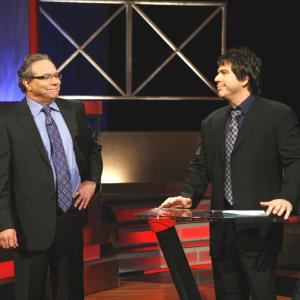 Still of Lewis Black and Greg Giraldo in Root of All Evil (2008)