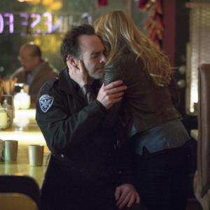 Still of Paul Blackthorne and Caity Lotz in Strele 2012